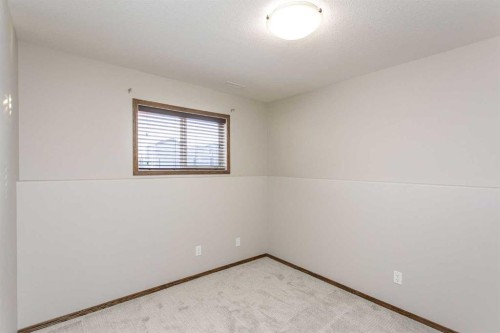 92 Iron Wolf Boulevard, Lacombe, AB - Indoor Photo Showing Other Room