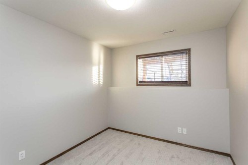 92 Iron Wolf Boulevard, Lacombe, AB - Indoor Photo Showing Other Room