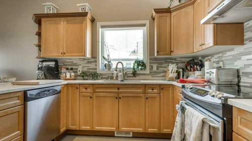 143 Ackerman Crescent, Red Deer, AB - Indoor Photo Showing Kitchen With Double Sink