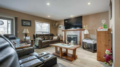 143 Ackerman Crescent, Red Deer, AB - Indoor Photo Showing Living Room With Fireplace