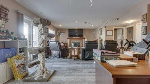 143 Ackerman Crescent, Red Deer, AB - Indoor Photo Showing Living Room With Fireplace