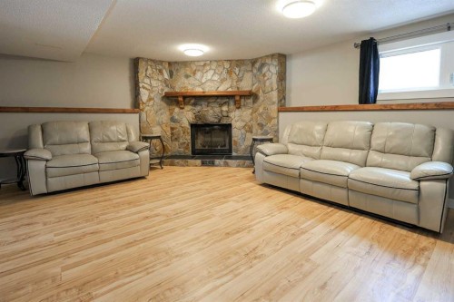 415 Barrett Drive, Red Deer, AB - Indoor Photo Showing Living Room With Fireplace