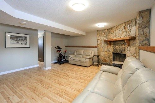 415 Barrett Drive, Red Deer, AB - Indoor Photo Showing Living Room With Fireplace