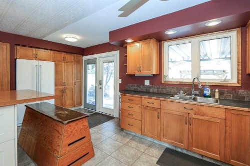 415 Barrett Drive, Red Deer, AB - Indoor Photo Showing Kitchen With Double Sink
