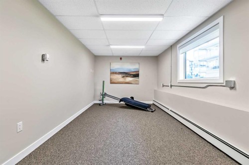 302-97 Station Drive, Sylvan Lake, AB - Indoor Photo Showing Other Room