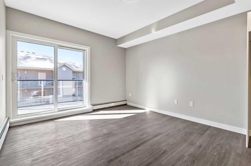 302-97 Station Drive, Sylvan Lake, AB - Indoor Photo Showing Other Room