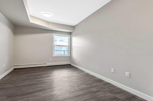302-97 Station Drive, Sylvan Lake, AB - Indoor Photo Showing Other Room