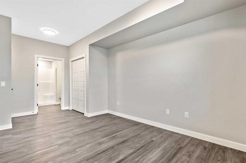302-97 Station Drive, Sylvan Lake, AB - Indoor Photo Showing Other Room