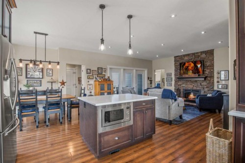 38272 Range Road 265, Rural Red Deer County, AB - Indoor Photo Showing Kitchen With Fireplace With Upgraded Kitchen