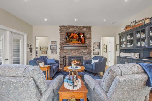 38272 Range Road 265, Rural Red Deer County, AB - Indoor Photo Showing Living Room With Fireplace