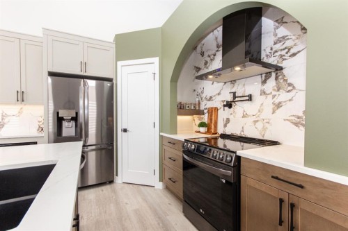 224 Emerald Drive, Red Deer, AB - Indoor Photo Showing Kitchen With Upgraded Kitchen