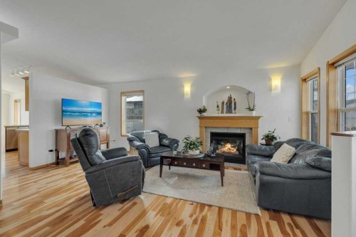118 Duval Crescent, Red Deer, AB - Indoor Photo Showing Living Room With Fireplace