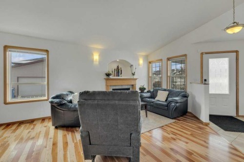 118 Duval Crescent, Red Deer, AB - Indoor Photo Showing Living Room With Fireplace