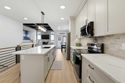 34 Mitchell Crescent, Blackfalds, AB - Indoor Photo Showing Kitchen With Upgraded Kitchen