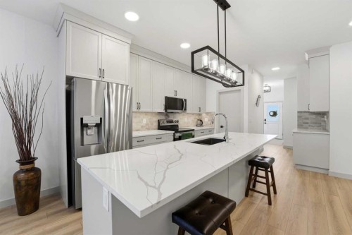 34 Mitchell Crescent, Blackfalds, AB - Indoor Photo Showing Kitchen With Upgraded Kitchen