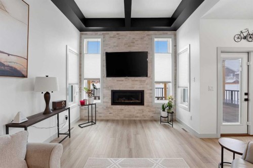 34 Mitchell Crescent, Blackfalds, AB - Indoor Photo Showing Living Room With Fireplace