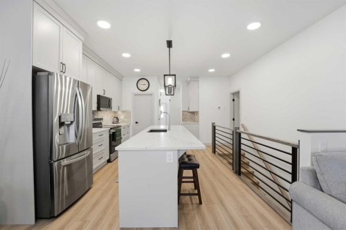 34 Mitchell Crescent, Blackfalds, AB - Indoor Photo Showing Kitchen With Upgraded Kitchen