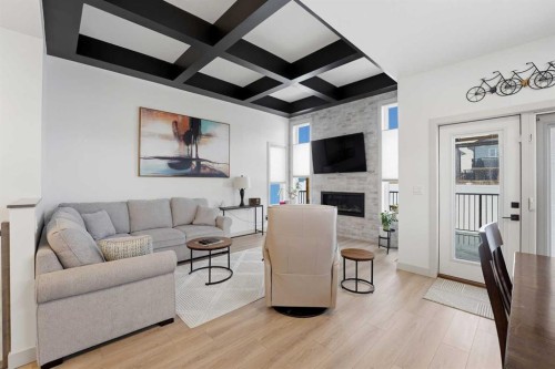 34 Mitchell Crescent, Blackfalds, AB - Indoor Photo Showing Living Room With Fireplace