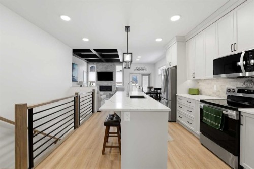 34 Mitchell Crescent, Blackfalds, AB - Indoor Photo Showing Kitchen With Upgraded Kitchen