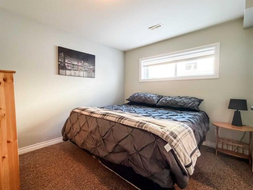 6701 41 Avenue, Stettler, AB - Indoor Photo Showing Bedroom