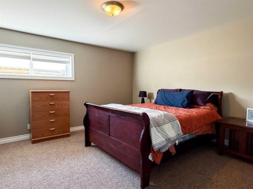 6701 41 Avenue, Stettler, AB - Indoor Photo Showing Bedroom