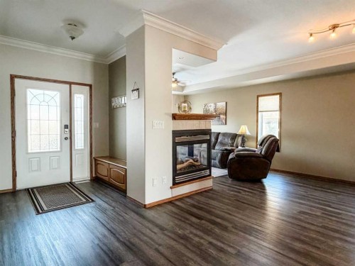6701 41 Avenue, Stettler, AB - Indoor With Fireplace