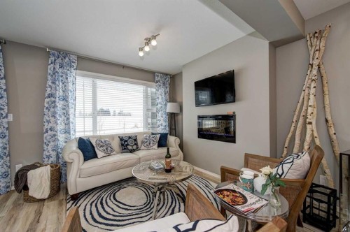 15 Golden Crescent, Red Deer, AB - Indoor Photo Showing Living Room With Fireplace