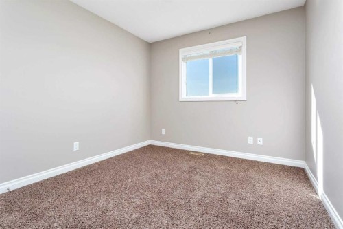 8 Ross Close, Sylvan Lake, AB - Indoor Photo Showing Other Room