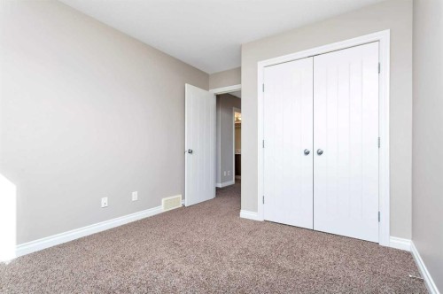 8 Ross Close, Sylvan Lake, AB - Indoor Photo Showing Other Room