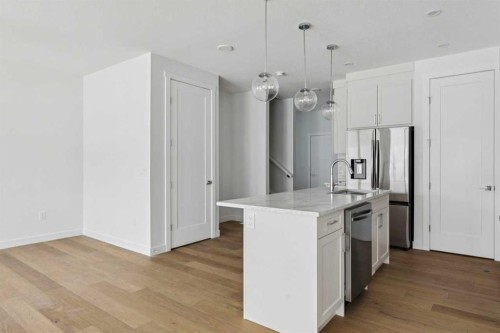 25 Linden Place, Rural Red Deer County, AB - Indoor Photo Showing Kitchen With Upgraded Kitchen