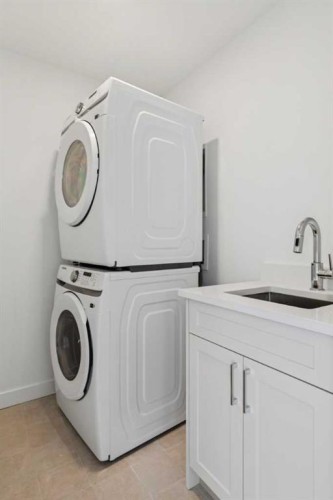 25 Linden Place, Rural Red Deer County, AB - Indoor Photo Showing Laundry Room