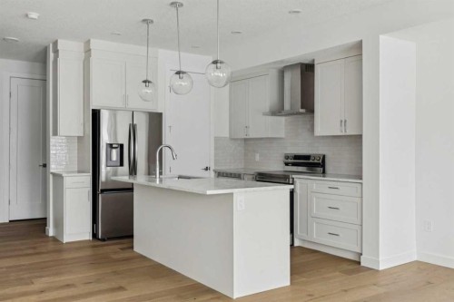 25 Linden Place, Rural Red Deer County, AB - Indoor Photo Showing Kitchen With Upgraded Kitchen
