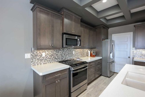 112 Eastpointe Drive, Blackfalds, AB - Indoor Photo Showing Kitchen With Stainless Steel Kitchen With Upgraded Kitchen