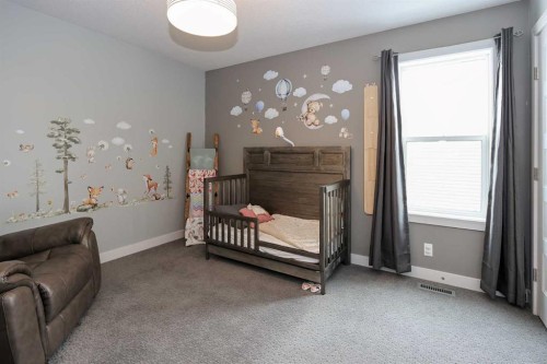 112 Eastpointe Drive, Blackfalds, AB - Indoor Photo Showing Bedroom