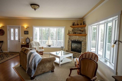 36067-42 Range Road Range, Rural Red Deer County, AB - Indoor Photo Showing Living Room With Fireplace