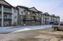 312-80A Kelloway Crescent, Red Deer, AB  - Outdoor With Balcony With Facade 
