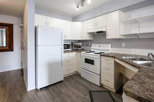 312-80A Kelloway Crescent, Red Deer, AB - Indoor Photo Showing Kitchen With Double Sink