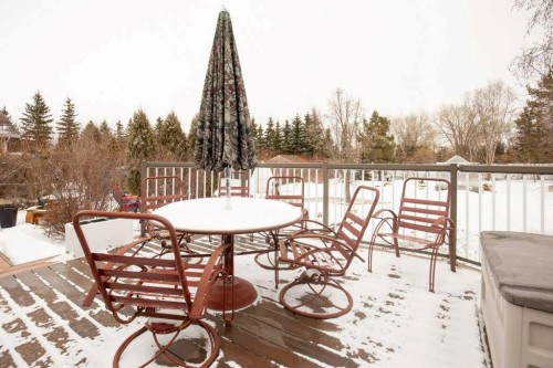 45 Ravenscrag Crescent, Norglenwold, AB - Outdoor With Deck Patio Veranda