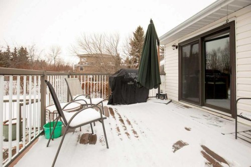 45 Ravenscrag Crescent, Norglenwold, AB - Outdoor With Deck Patio Veranda With Exterior