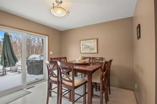 45 Ravenscrag Crescent, Norglenwold, AB - Indoor Photo Showing Dining Room