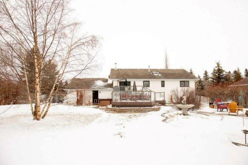 45 Ravenscrag Crescent, Norglenwold, AB - Outdoor With Deck Patio Veranda