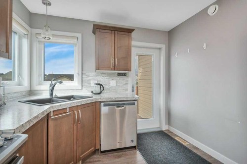 14 Cascade Street, Blackfalds, AB - Indoor Photo Showing Kitchen With Double Sink