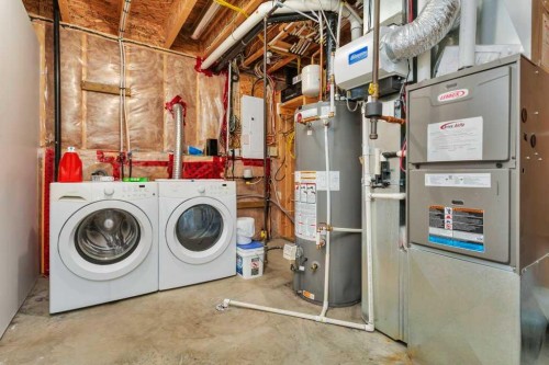 14 Cascade Street, Blackfalds, AB - Indoor Photo Showing Laundry Room