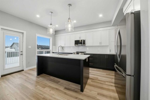 70 Palmer Circle, Blackfalds, AB - Indoor Photo Showing Kitchen With Upgraded Kitchen