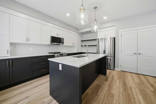 70 Palmer Circle, Blackfalds, AB - Indoor Photo Showing Kitchen With Stainless Steel Kitchen With Double Sink With Upgraded Kitchen