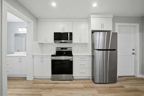 70 Palmer Circle, Blackfalds, AB - Indoor Photo Showing Kitchen With Stainless Steel Kitchen