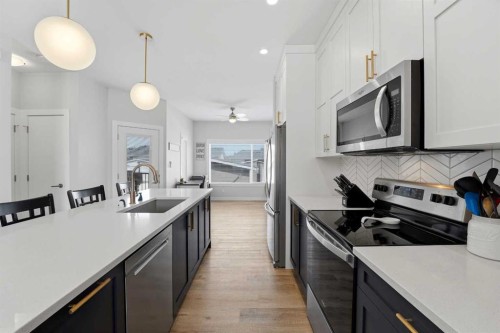 44 Evergreen Way, Red Deer, AB - Indoor Photo Showing Kitchen With Stainless Steel Kitchen With Upgraded Kitchen
