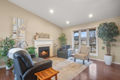 45 Emily Crescent, Lacombe, AB - Indoor Photo Showing Living Room With Fireplace