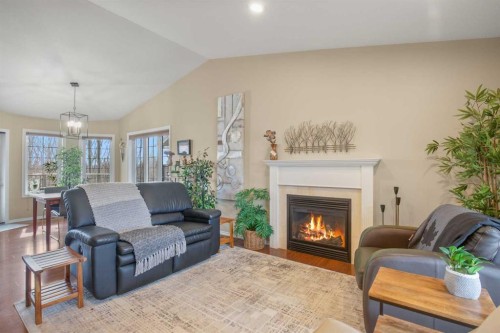 45 Emily Crescent, Lacombe, AB - Indoor Photo Showing Living Room With Fireplace
