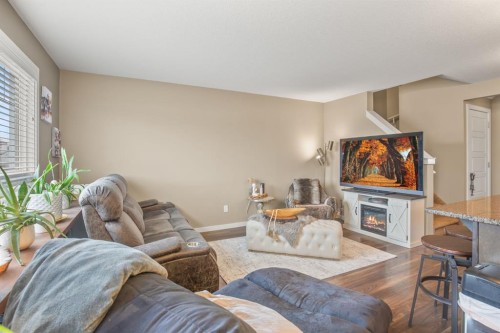 6 Van Slyke Way, Red Deer, AB - Indoor Photo Showing Living Room With Fireplace